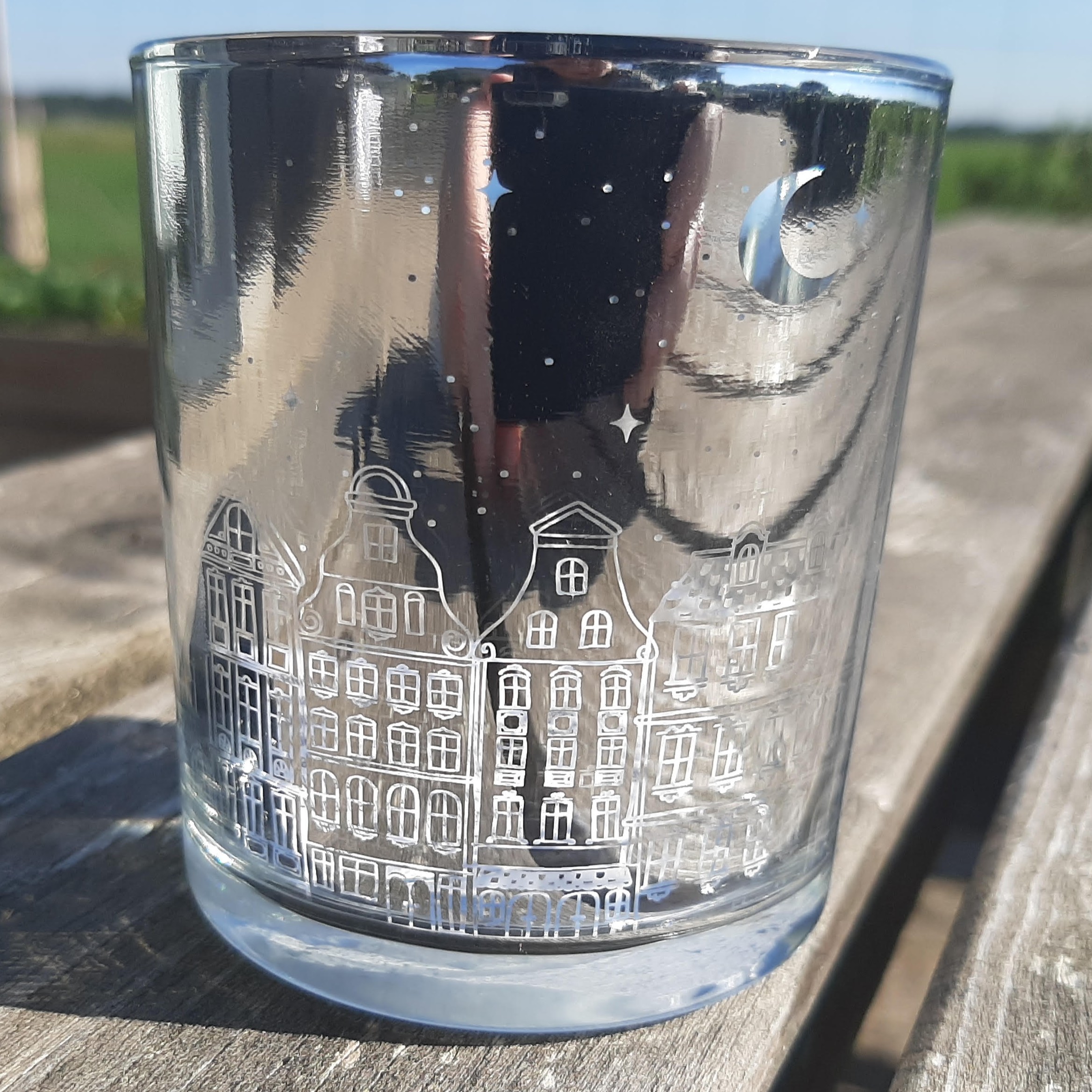 Glazen waxinelichthouder zilver, decor van dorpshuisjes, sterren en maan