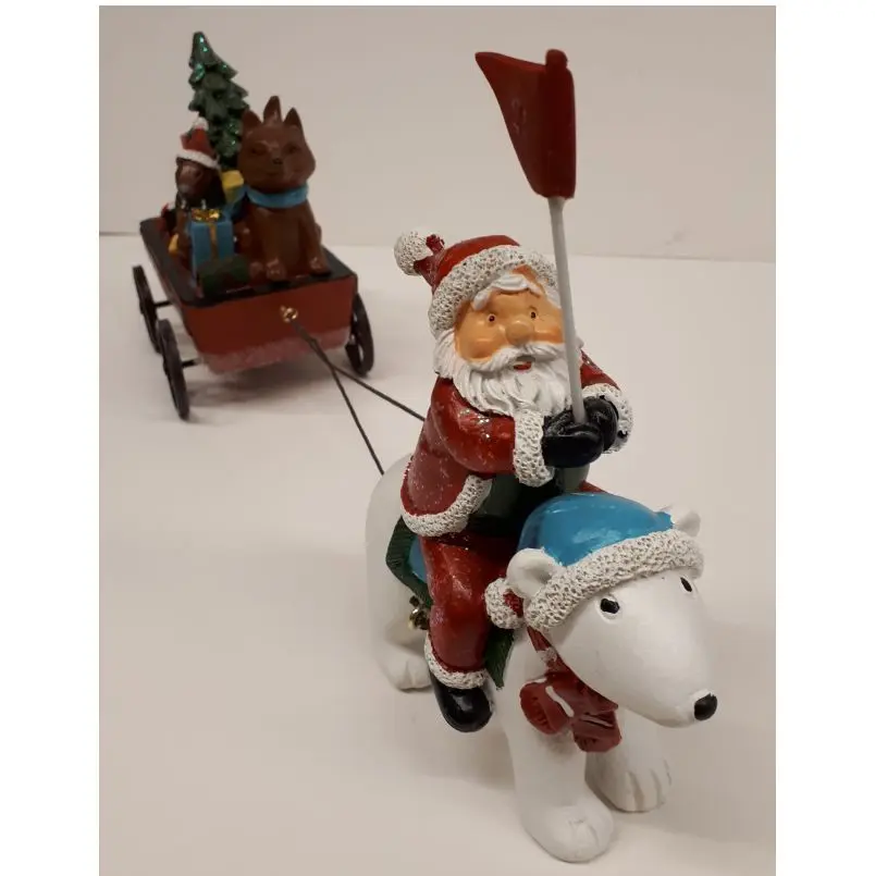 Kerstman op ijsbeer met volle kar en kerstboom