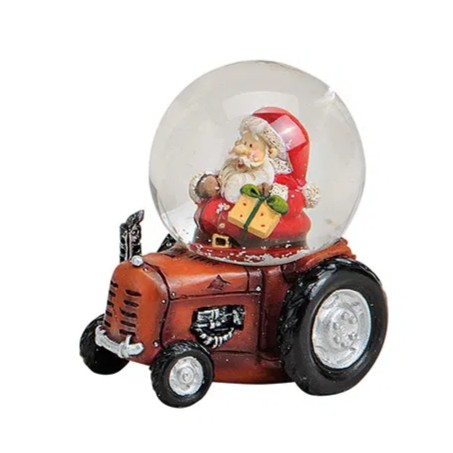 Kleine sneeuwbol kerst met tractor rood