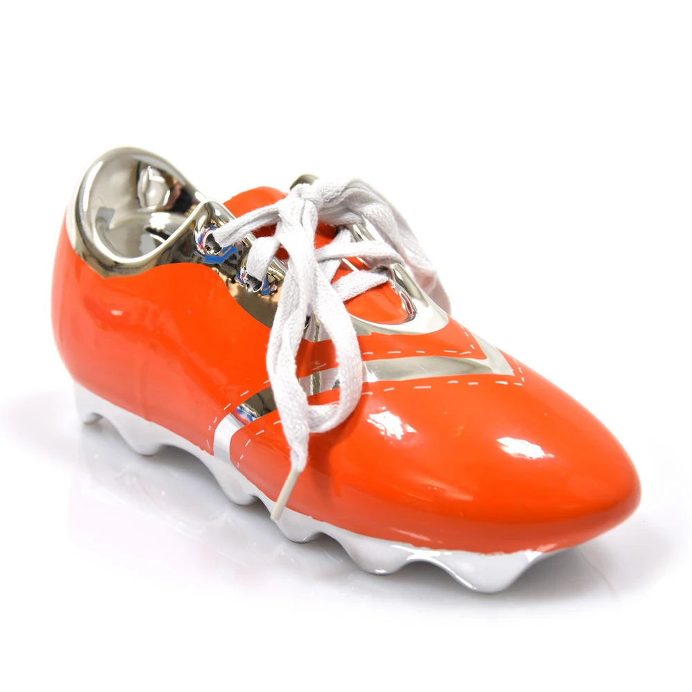 Spaarpot voetbal schoen van keramiek oranje